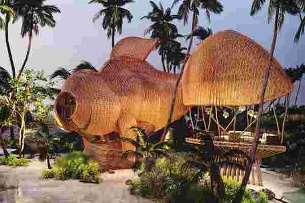 This bamboo beach-shack is designed to look like a massive goldfish!