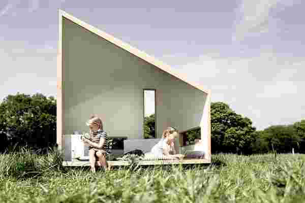 This flat-packed sustainable cabin is every child’s dream playhouse!