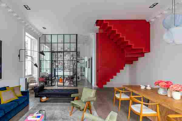 This floating red staircase brings a modern Harry Potter element to this London apartment!